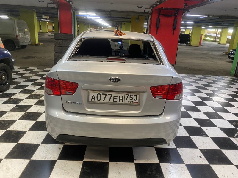 Замена заднего стекла Kia Cerato